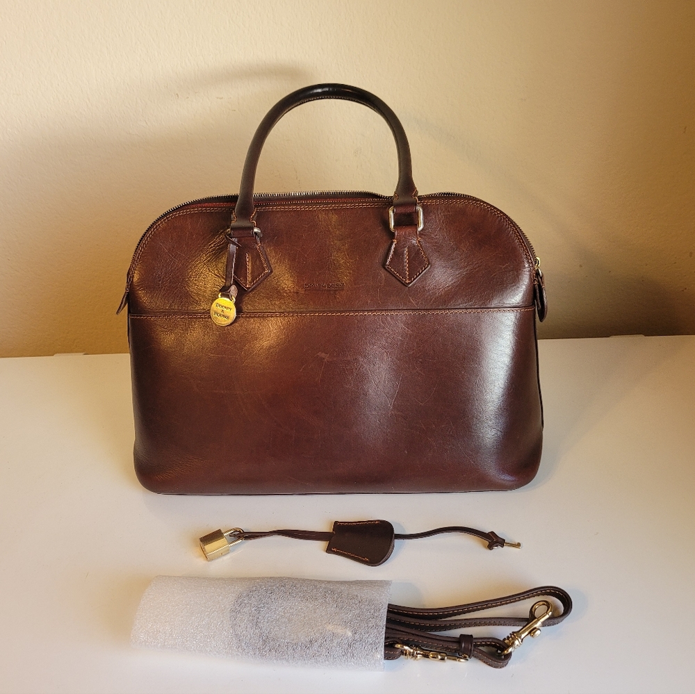 Dooney and Bourke rare dark brown bag with orange stitching